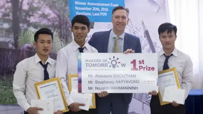 Students holding certificates